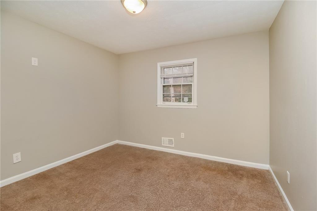 4033 Emerald N Circle Decatur, GA 30035 - Photo 17 of 25 an empty room with a window