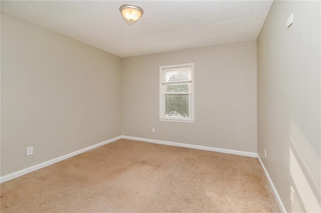 4033 Emerald N Circle Decatur, GA 30035 - Photo 18 of 25 an empty room with windows