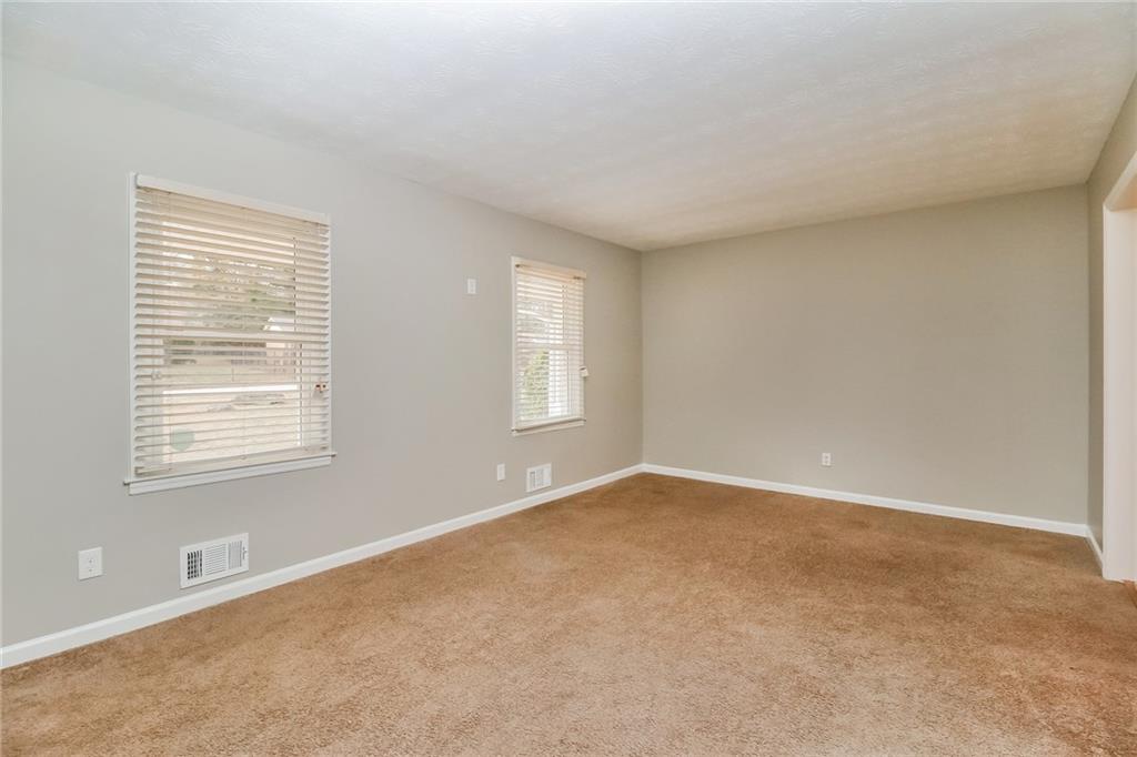 4033 Emerald N Circle Decatur, GA 30035 - Photo 3 of 25 a view of an empty room with a window