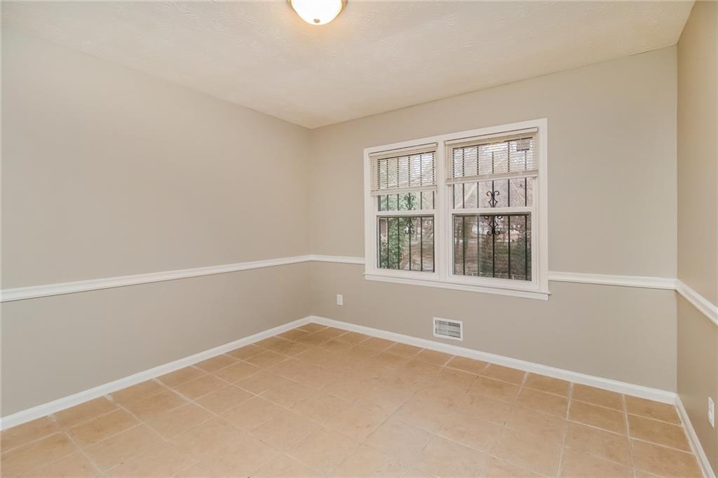 4033 Emerald N Circle Decatur, GA 30035 - Photo 5 of 25 an empty room with a window