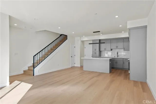 a view of kitchen with counter top space and stainless steel appliances