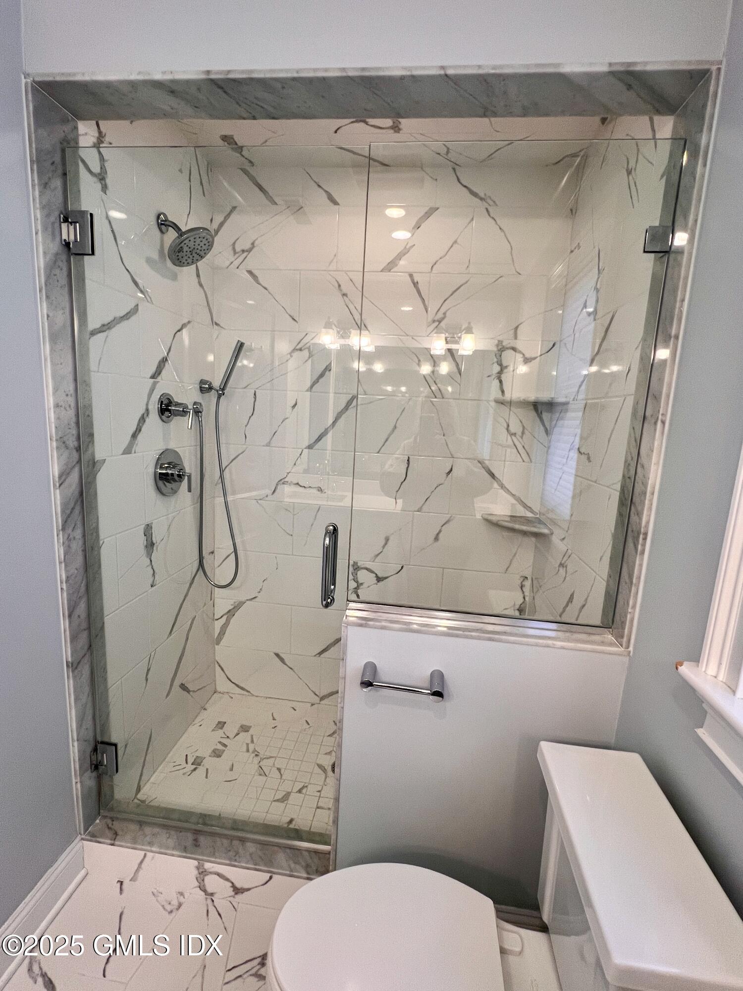 31 Moshier Street, Unit B Greenwich, CT 06831 - Photo 11 of 28 a bathroom with a toilet sink and shower