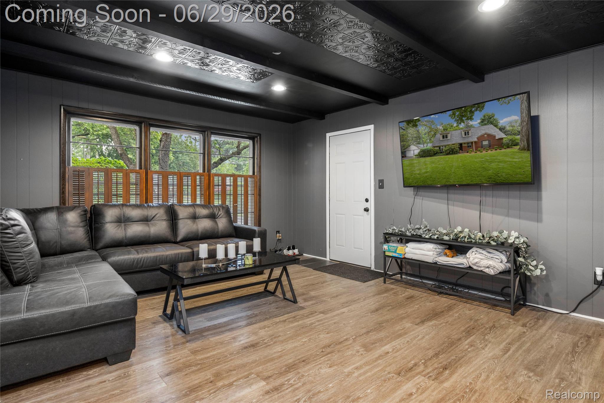 6085 Worlington Road Bloomfield Hills, MI 48301 - Photo 24 of 75 Spacious 2nd Living Room featuring wood-finish flooring, dark paneled walls, and a recessed lighting system