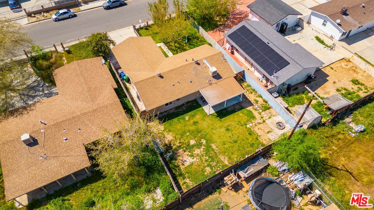 38466 Sumac Avenue Palmdale, CA 93550 - Photo 18 of 18 an aerial view of a house with a yard and furniture