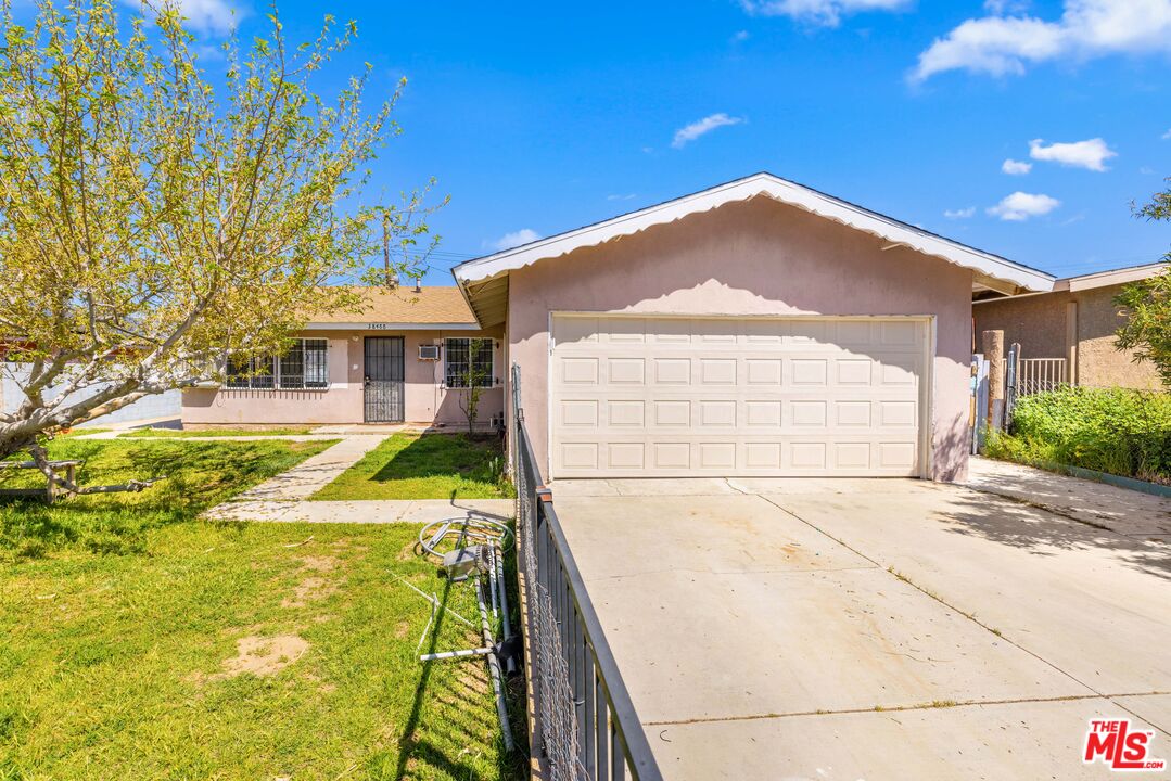 38466 Sumac Avenue Palmdale, CA 93550 - Photo 3 of 18 a view of a house with a swimming pool