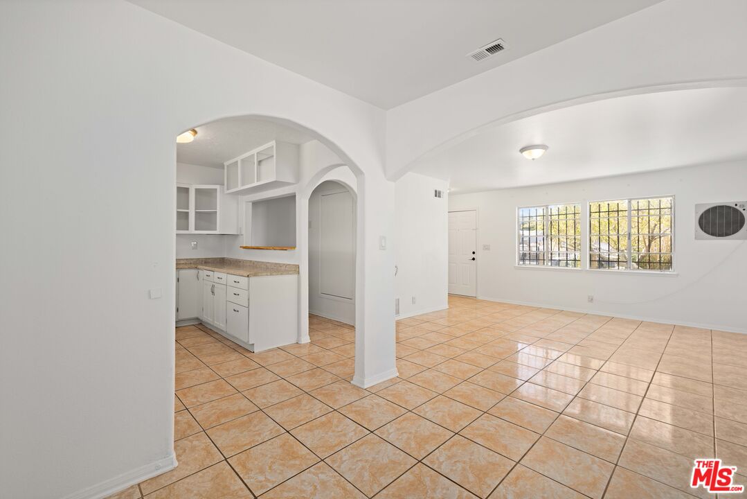 38466 Sumac Avenue Palmdale, CA 93550 - Photo 9 of 18 a view of a kitchen with windows