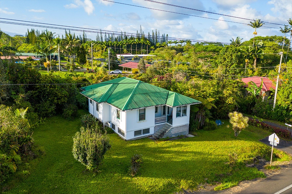 18-1222 Volcano Road Mountain View, HI 96771 - Photo 1 of 29 a view of a backyard with plants