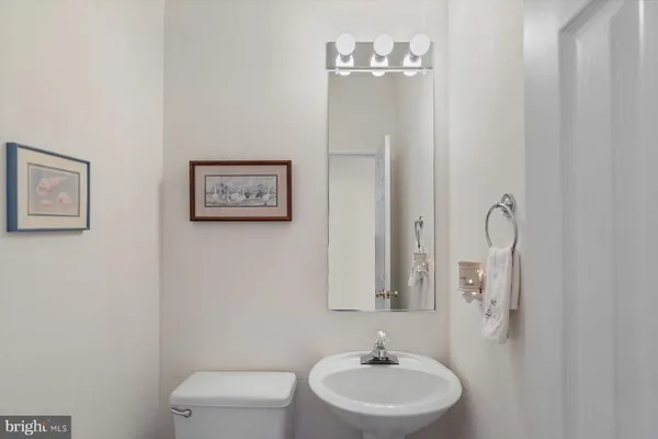a en suite bathroom with a sink and a mirror