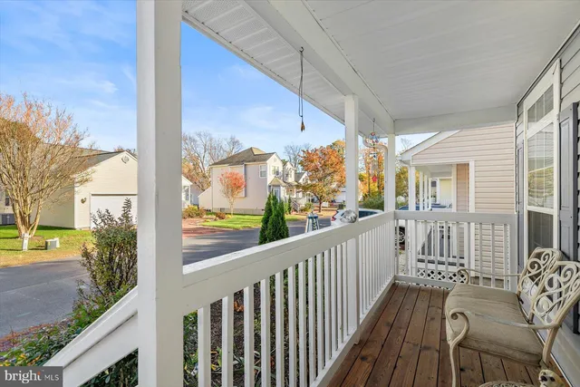 a front view of a house with grey walls