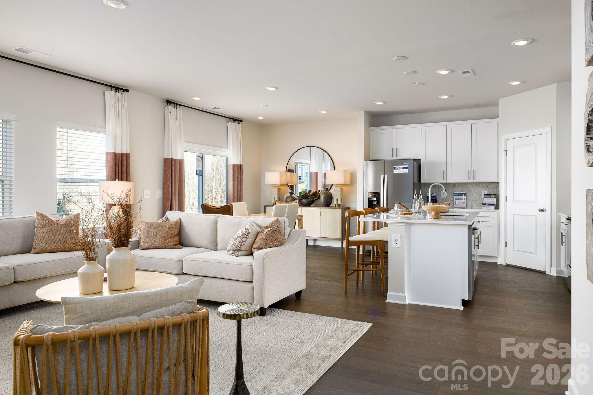 179 Murphy Mdw Road Mocksville, NC 27028 - Photo 13 of 43 a living room with kitchen island furniture and a wooden floor