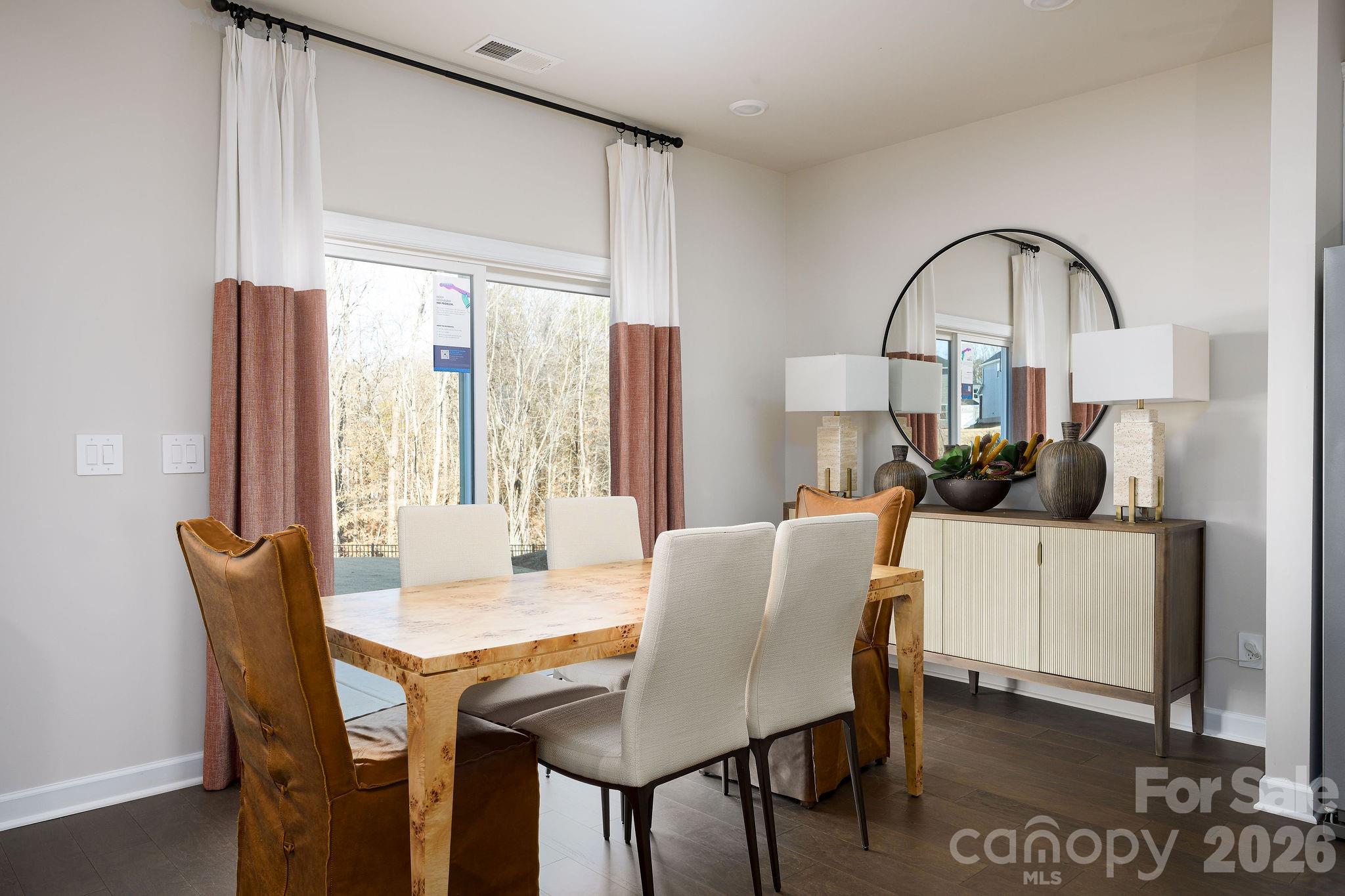 179 Murphy Mdw Road Mocksville, NC 27028 - Photo 21 of 43 a view of a dining room with furniture window and wooden floor