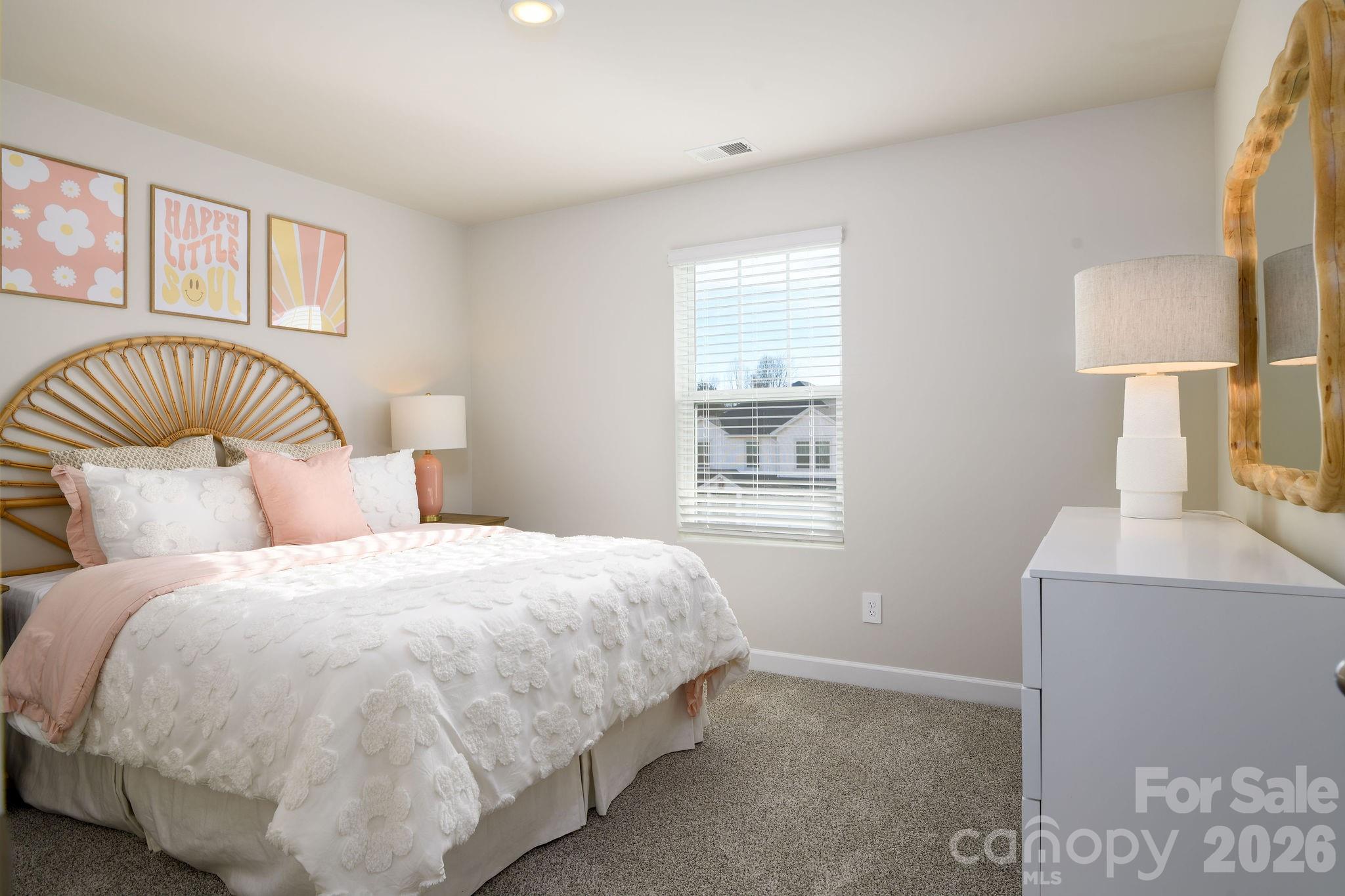 179 Murphy Mdw Road Mocksville, NC 27028 - Photo 23 of 43 a bedroom with a bed and a window