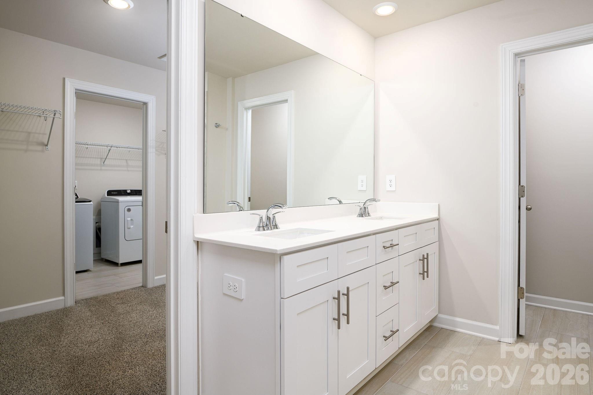 179 Murphy Mdw Road Mocksville, NC 27028 - Photo 28 of 43 a bathroom with a double vanity sink and mirror