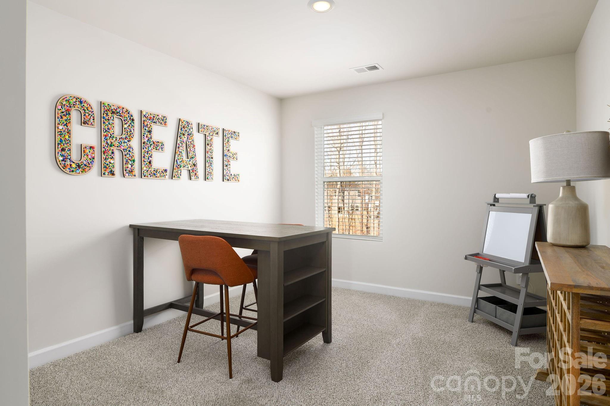 179 Murphy Mdw Road Mocksville, NC 27028 - Photo 36 of 43 a workspace room with furniture and window