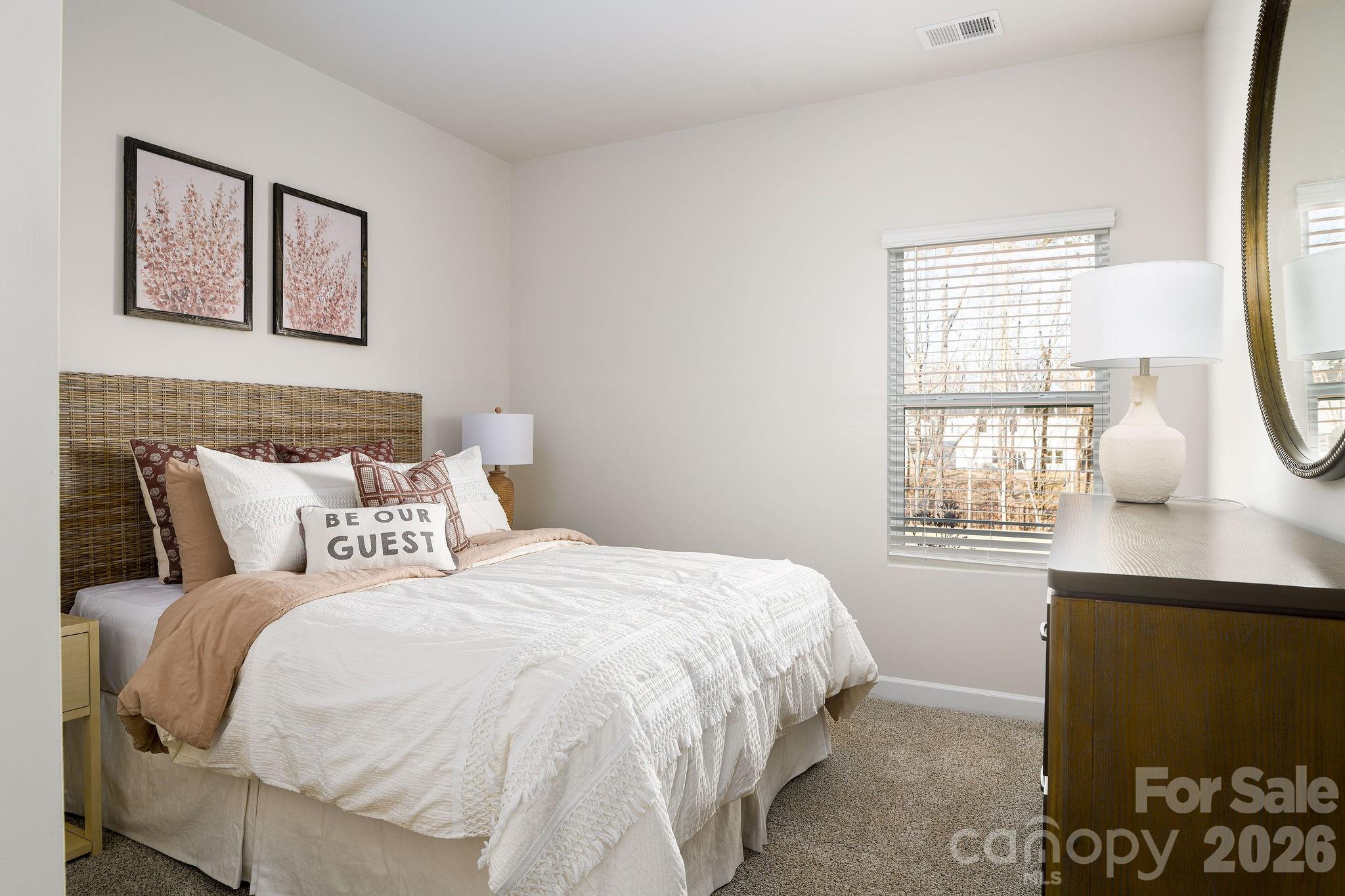 179 Murphy Mdw Road Mocksville, NC 27028 - Photo 41 of 43 a bedroom with a bed and window