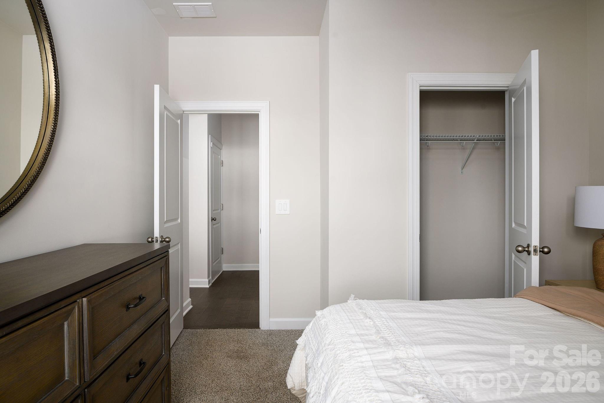 179 Murphy Mdw Road Mocksville, NC 27028 - Photo 42 of 43 a bedroom with a bed and a dresser