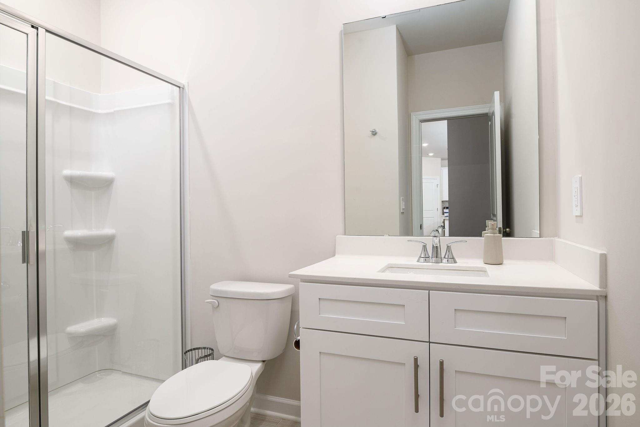 179 Murphy Mdw Road Mocksville, NC 27028 - Photo 43 of 43 a bathroom with a sink a toilet and shower