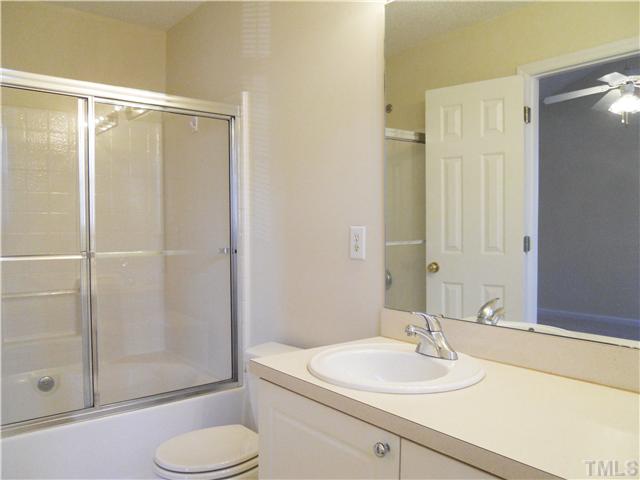 2004 Metacomet Way Raleigh, NC 27604 - Photo 15 of 23 a bathroom with a sink toilet and shower