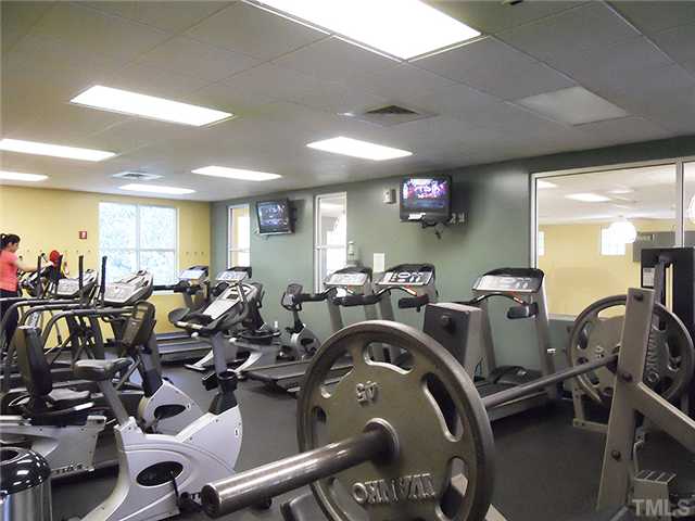 2004 Metacomet Way Raleigh, NC 27604 - Photo 23 of 23 a gym room with lots of gym equipment