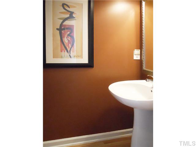 2004 Metacomet Way Raleigh, NC 27604 - Photo 3 of 23 a bathroom with a sink and a mirror