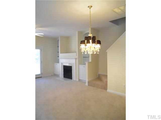 2004 Metacomet Way Raleigh, NC 27604 - Photo 4 of 23 a view of a livingroom with a chandelier