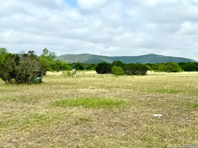 a house view with swimming pool