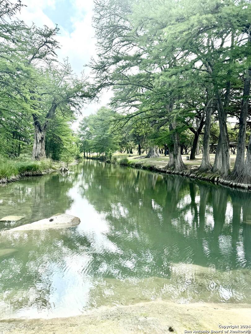 1189 North A Cr Concan, TX 78838 - Photo 2 of 68 a view of lake with green space