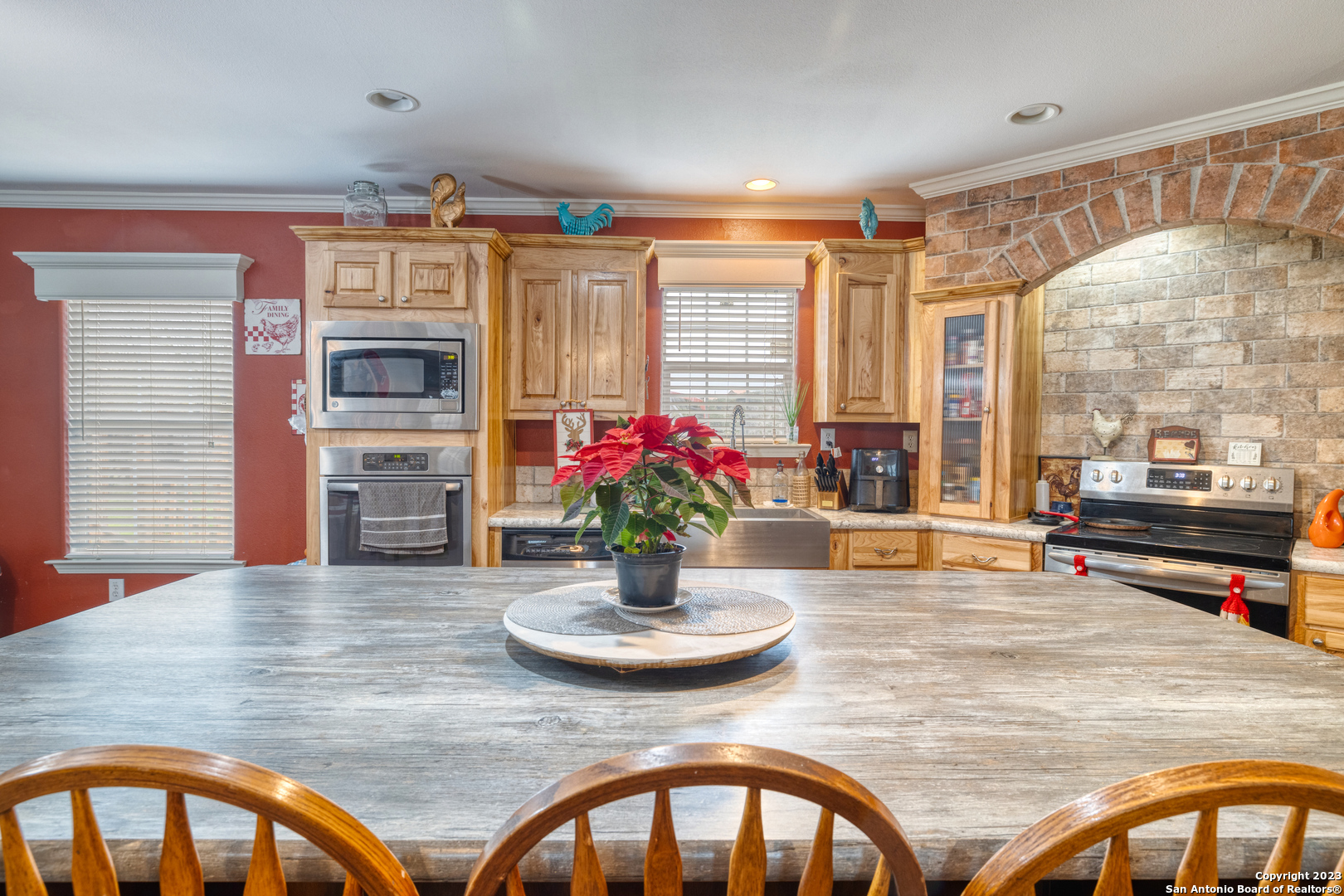 1189 North A Cr Concan, TX 78838 - Photo 50 of 68 a kitchen with a table and chairs in it