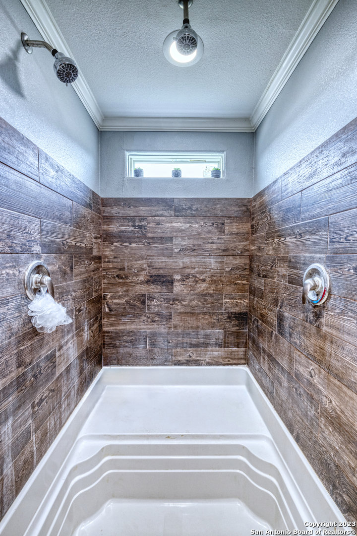 1189 North A Cr Concan, TX 78838 - Photo 66 of 68 a bathroom with a bathtub