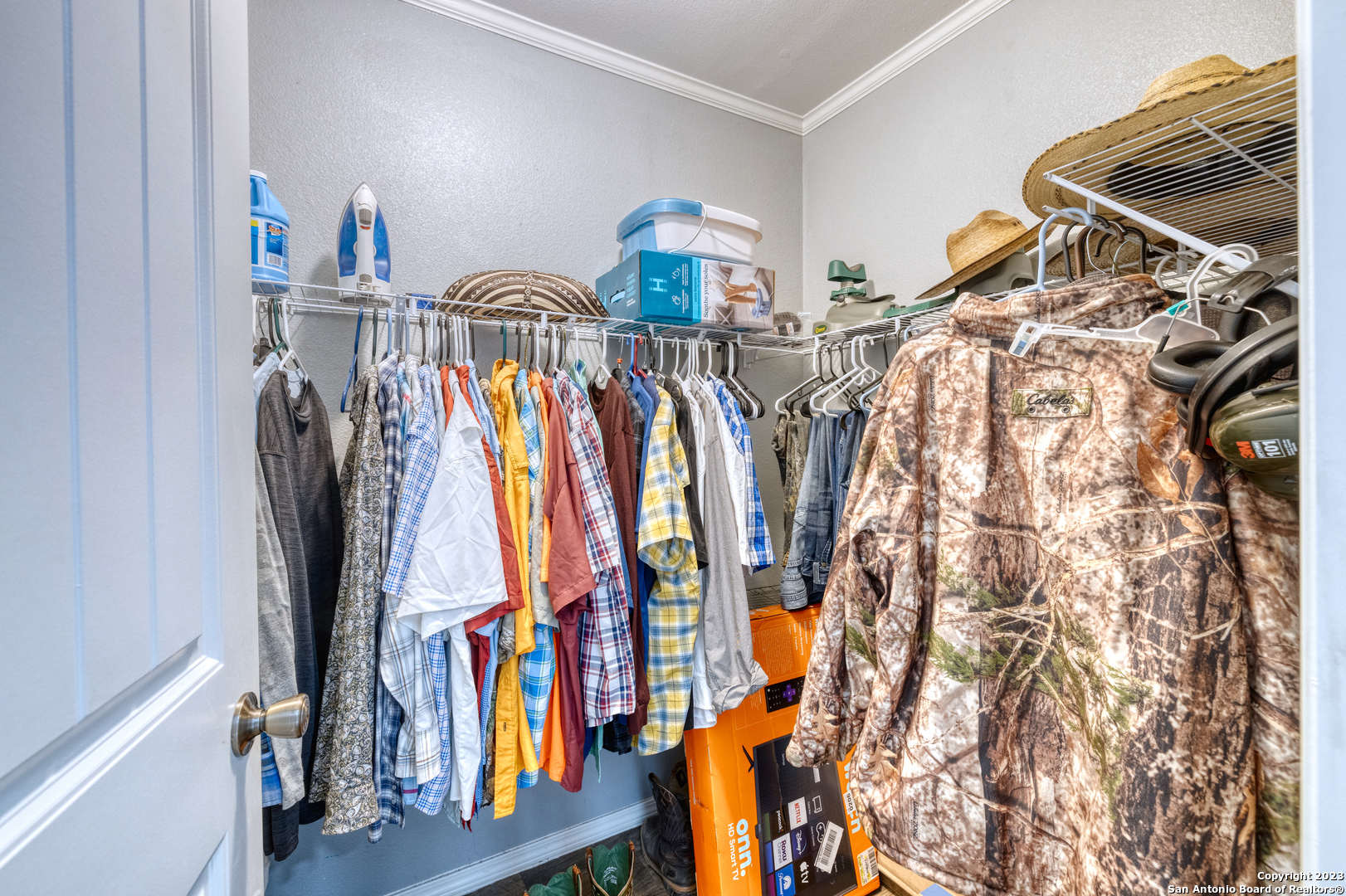 1189 North A Cr Concan, TX 78838 - Photo 68 of 68 a view of walk in closet with clothes and shoes