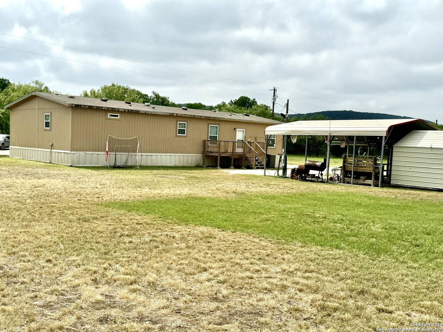 1189 North A Cr Concan, TX 78838 - Photo 10 of 68 a view of a patio with a table and chairs