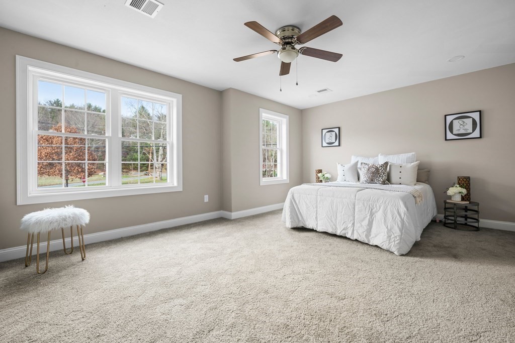 184 Berlin Road Bolton, MA 01740 - Photo 14 of 33 a bed room with a bed and a large window