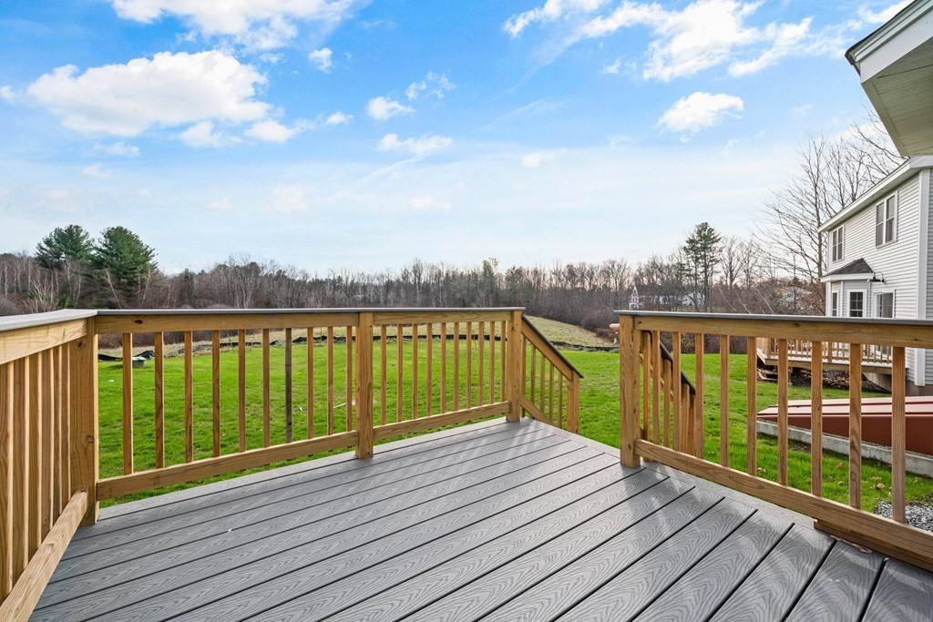 184 Berlin Road Bolton, MA 01740 - Photo 24 of 33 a view of river and deck with wooden floor