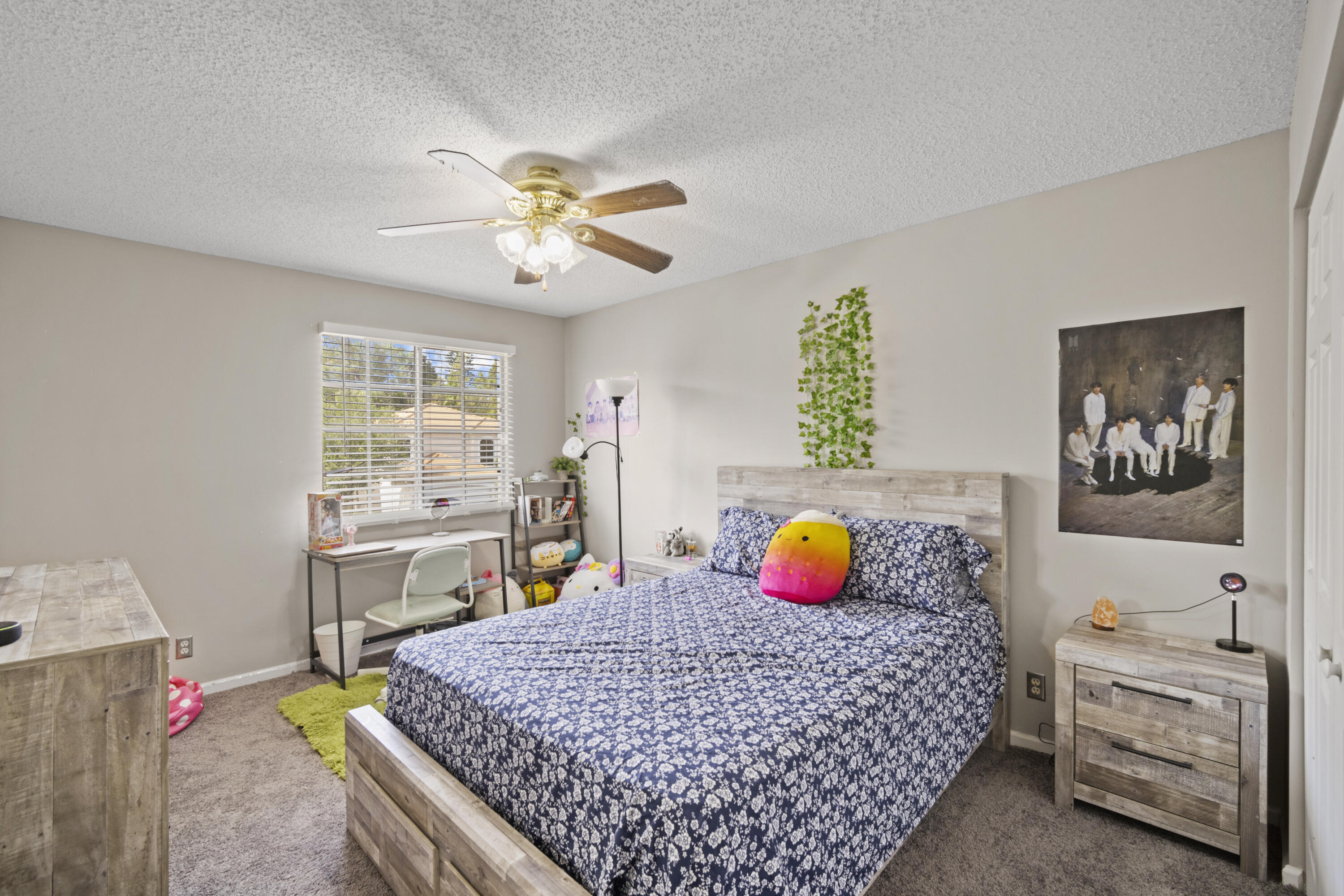 6427 Adriatic Way Greenacres, FL 33413 - Photo 14 of 33 a bedroom with a bed and a table in it