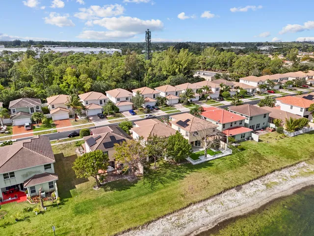 an aerial view of a house with a garden