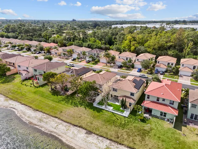 an aerial view of a house with a garden