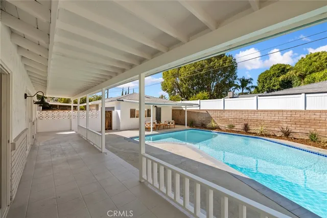 a view of a porch and garden