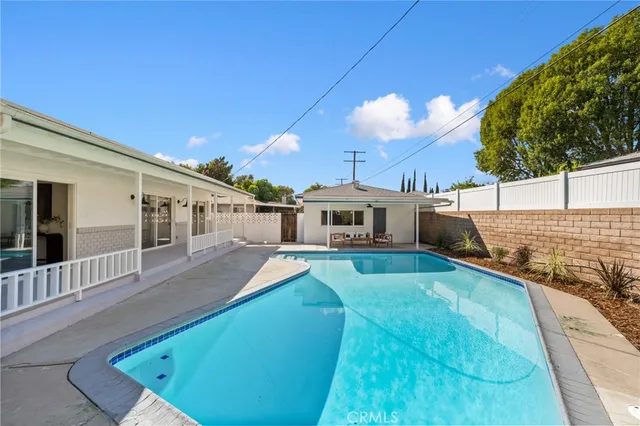 a view of a house with a swimming pool