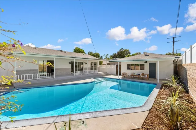 a front view of house with yard and seating area