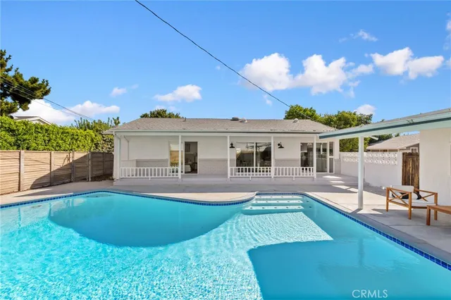 a view of a house with a swimming pool