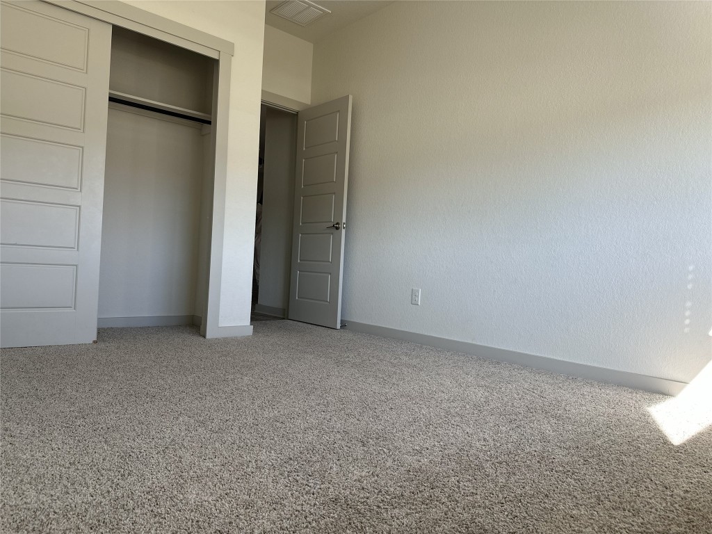 241 Deserti Road Leander, TX 78641 - Photo 13 of 24 an empty room with closet