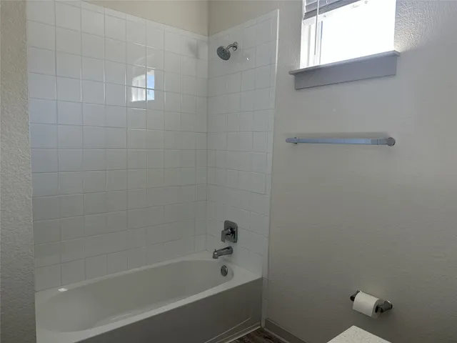 a bathroom with a bathtub