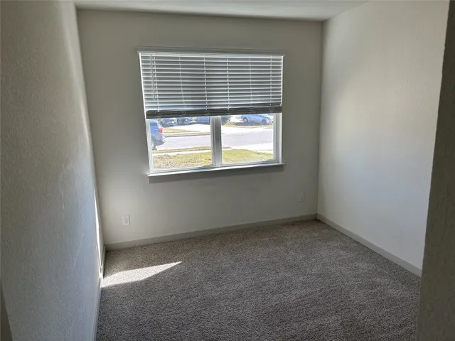 an empty room with a window