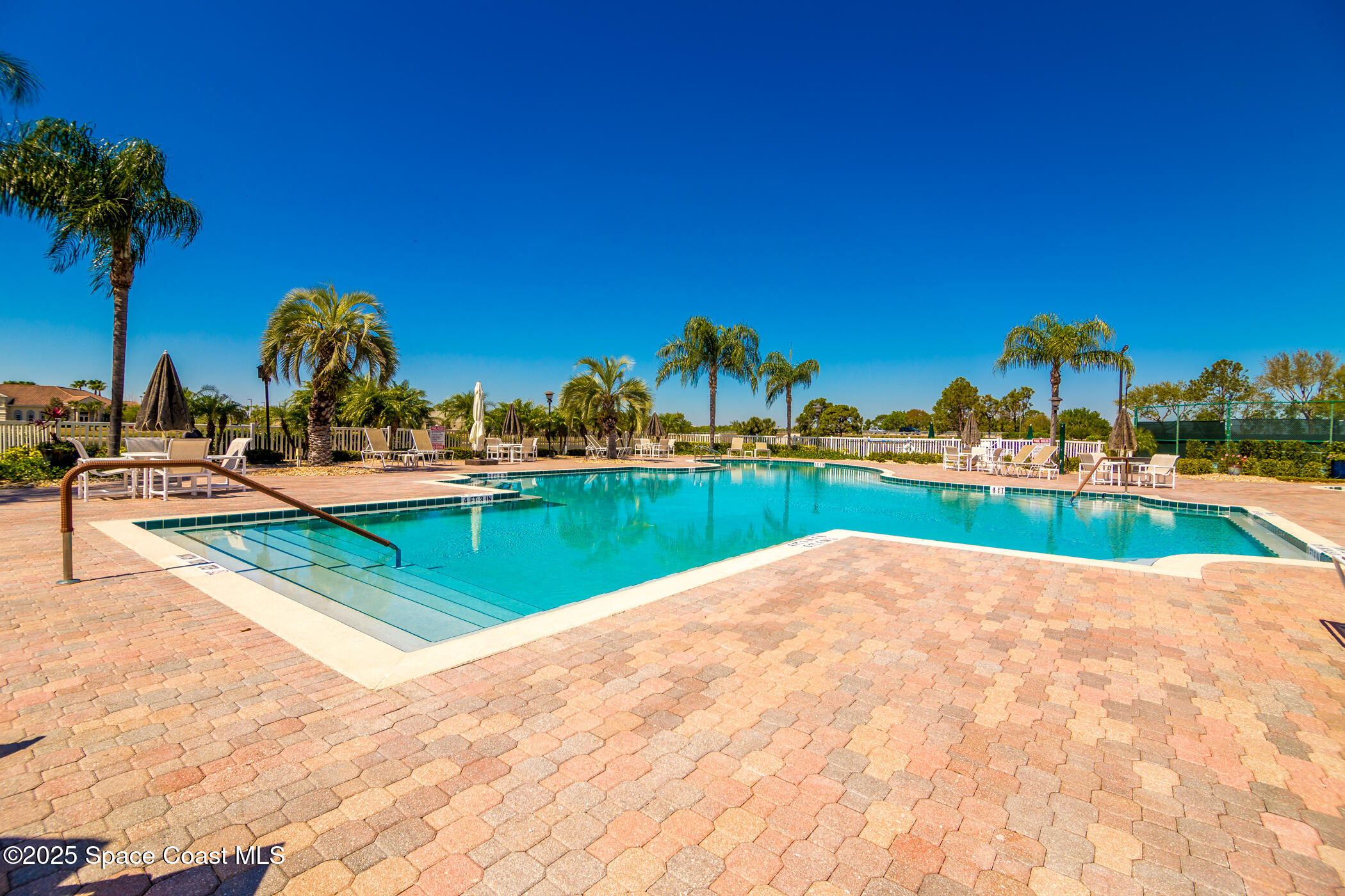 1703 Keys Gate Drive Melbourne, FL 32940 - Photo 11 of 44 a view of an outdoor space and swimming pool