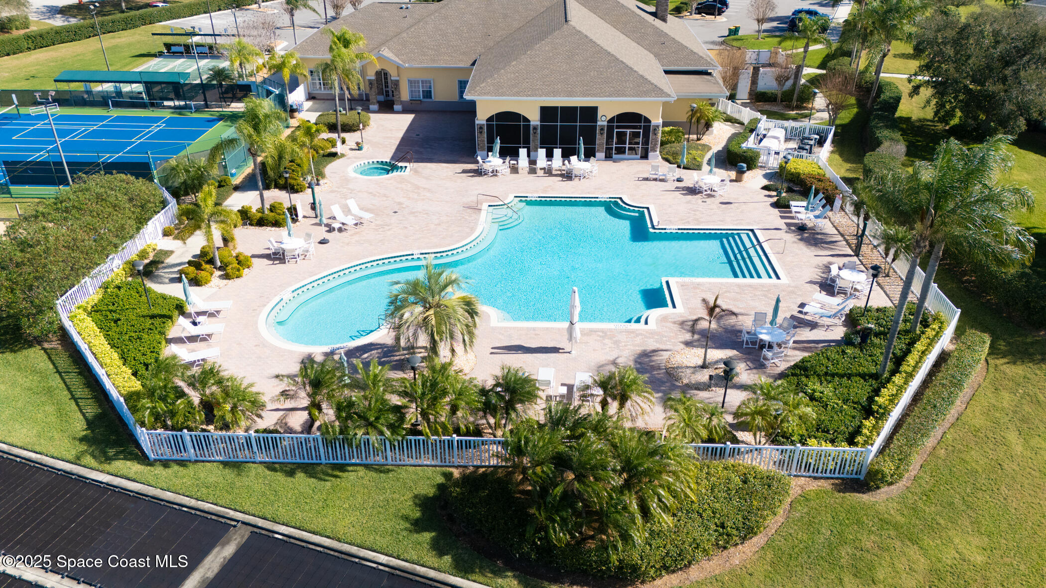 1703 Keys Gate Drive Melbourne, FL 32940 - Photo 17 of 44 a view of a swimming pool with a patio