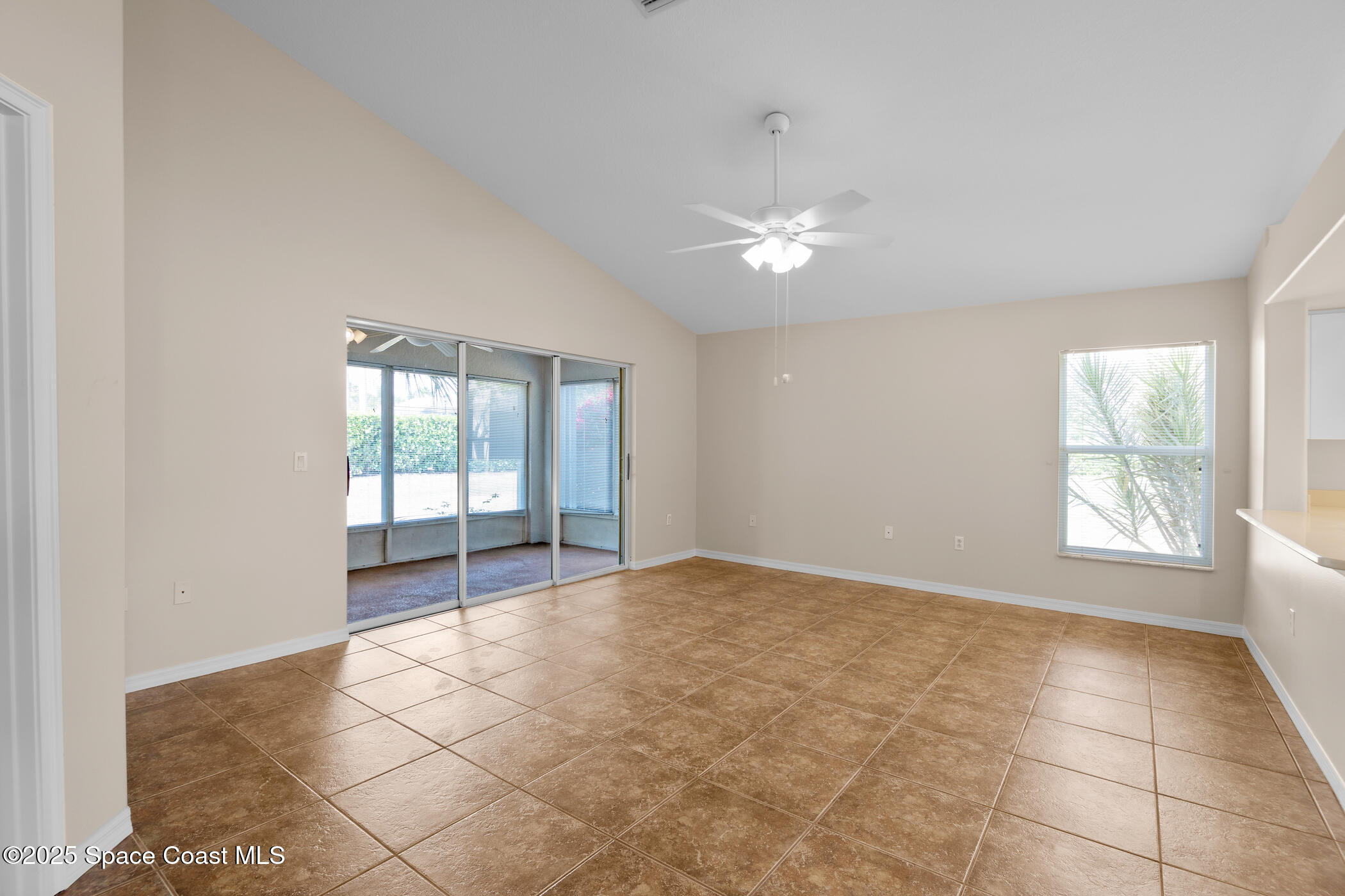 1703 Keys Gate Drive Melbourne, FL 32940 - Photo 19 of 44 a view of an empty room with a window