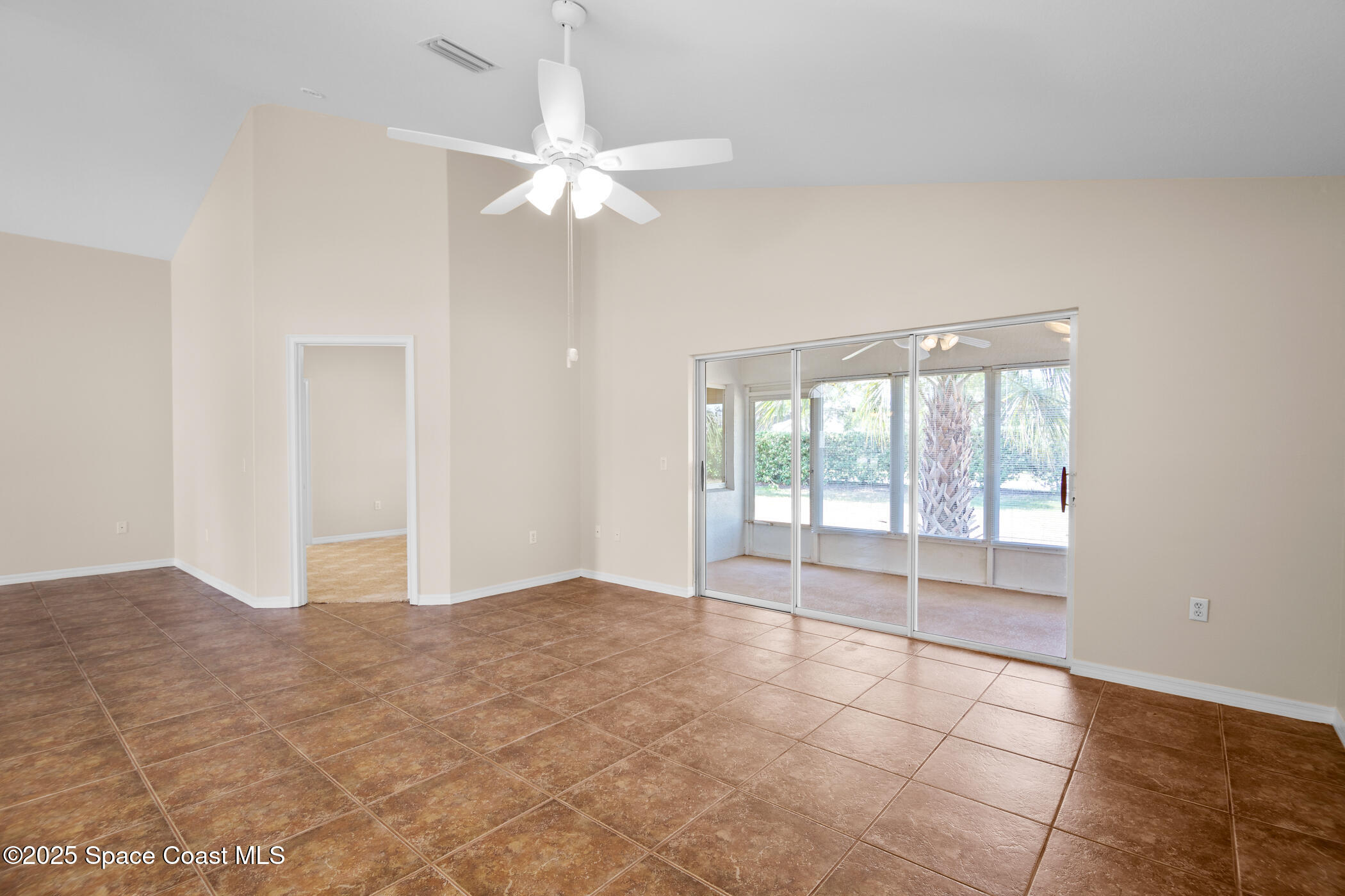 1703 Keys Gate Drive Melbourne, FL 32940 - Photo 44 of 44 a view of an empty room with a window