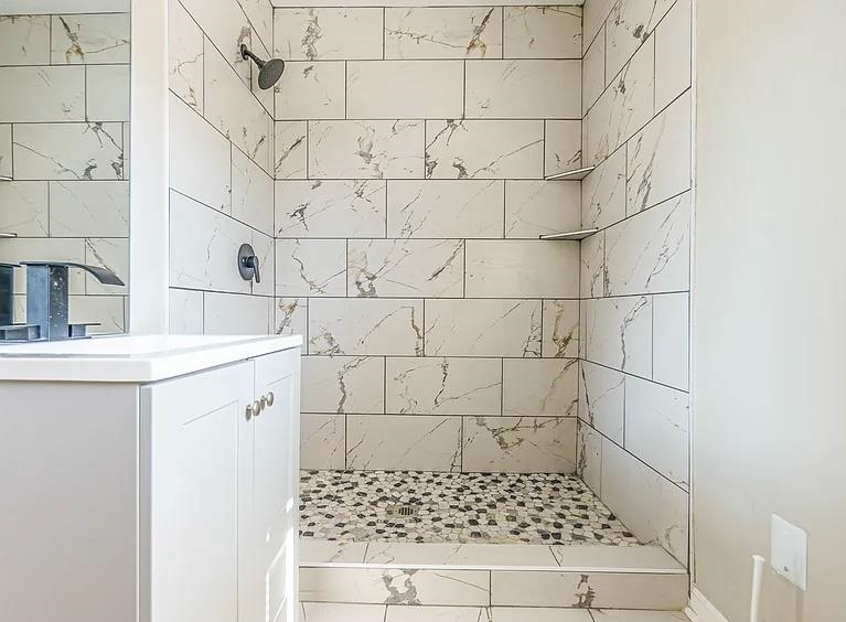 96 Modder Avenue Memphis, TN 38109 - Photo 8 of 12 a bathroom with a shower