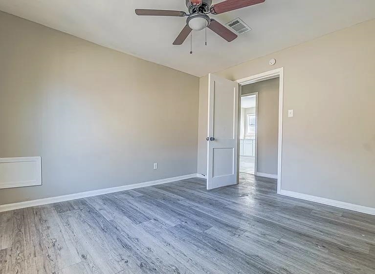 96 Modder Avenue Memphis, TN 38109 - Photo 10 of 12 a view of an empty room and wooden floor