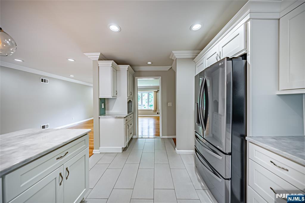 71 Columbus Road Demarest, NJ 07627 - Photo 12 of 50 a kitchen with a refrigerator and a sink